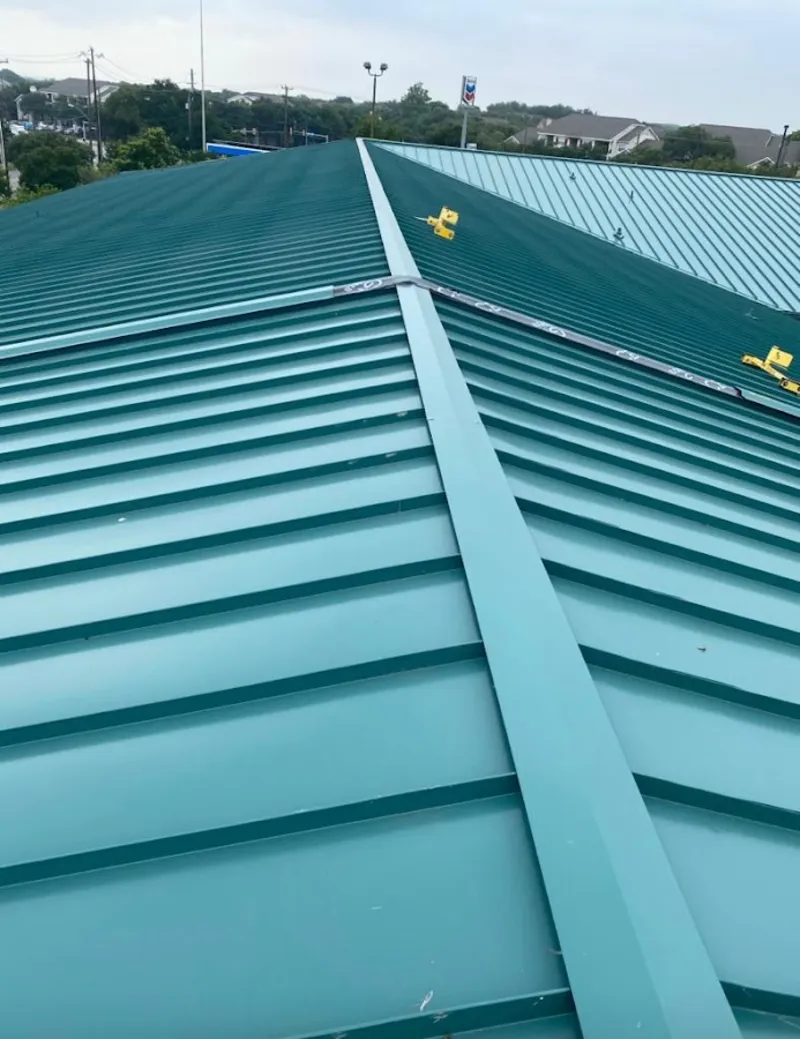 Green commercial metal roof ridge and valley for Metal Roof Repair in Nampa