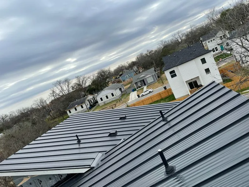 Standing seam metal roof panels with vents for Skylight Repair in Nampa